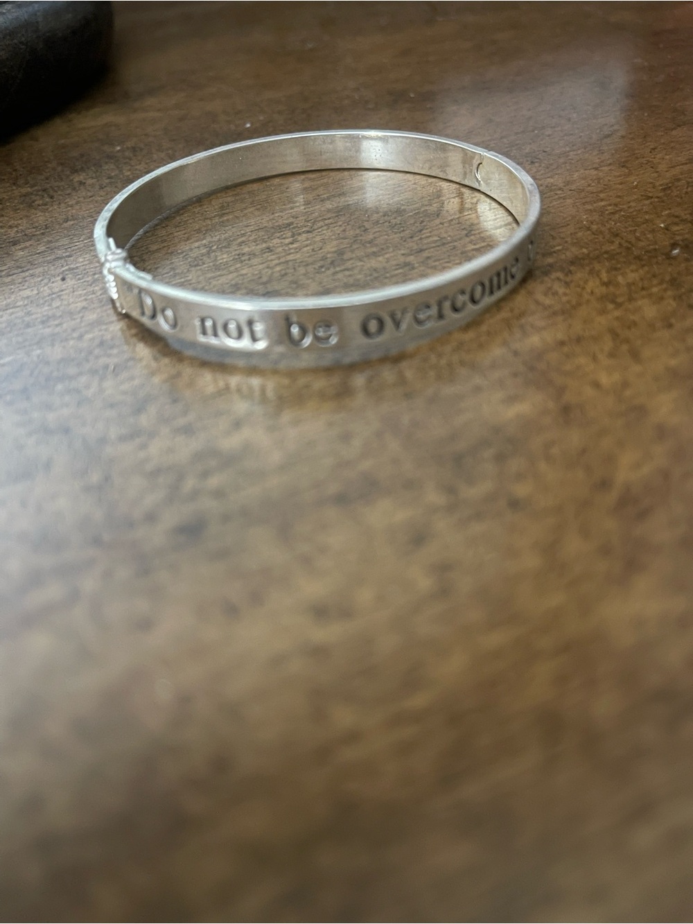 Silver Inspirational Engraved Bangle — "Do not be overcome"